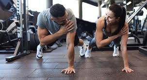 Toning Bingo Wings: Your Ultimate Guide to Sculpting Sleek Arms at the Gym 3 Fitness trainer demonstrating arm toning exercises Sudbury