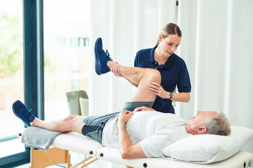 Revitalising Recovery: Effective Rehabilitation Strategies for Muscle Injuries 3 Physiotherapist assisting a patient with muscle recovery exercises Sudbury
