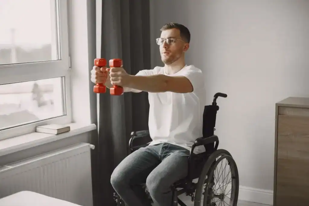 Empowering Weight Loss: A Comprehensive Guide for Individuals with Disabilities 1 Image of man doing exercise in his wheelchair to aid weight loss Sudbury