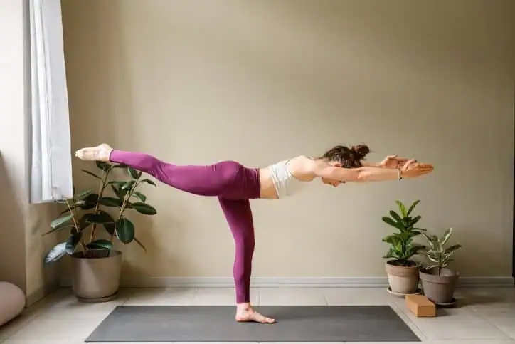 Achieving the Perfect Tone: How Often Should You Exercise for Results? 1 Woman doing Yoga exercise Sudbury to help with toning the body.