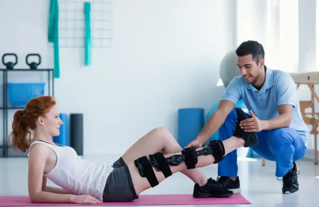 Woman having treatment to help muscle recovery Sudbury after an injury